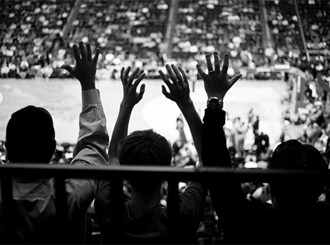 Basketball arena promotional header style image with game night energy